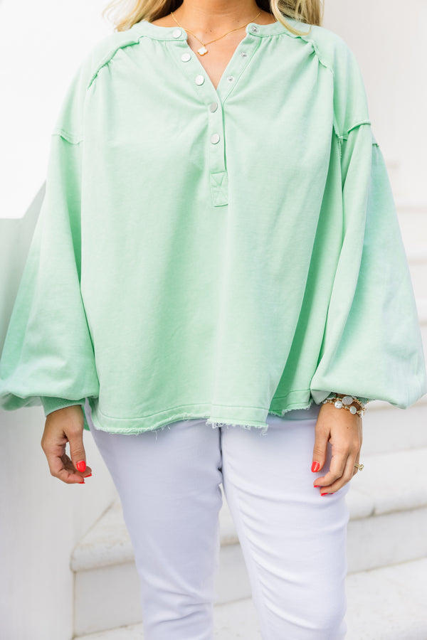 Chic Soul plus size clothing, mint long sleeve pullover with button up detail on neckline with cuffed puff sleeves with raw hem along bottom
