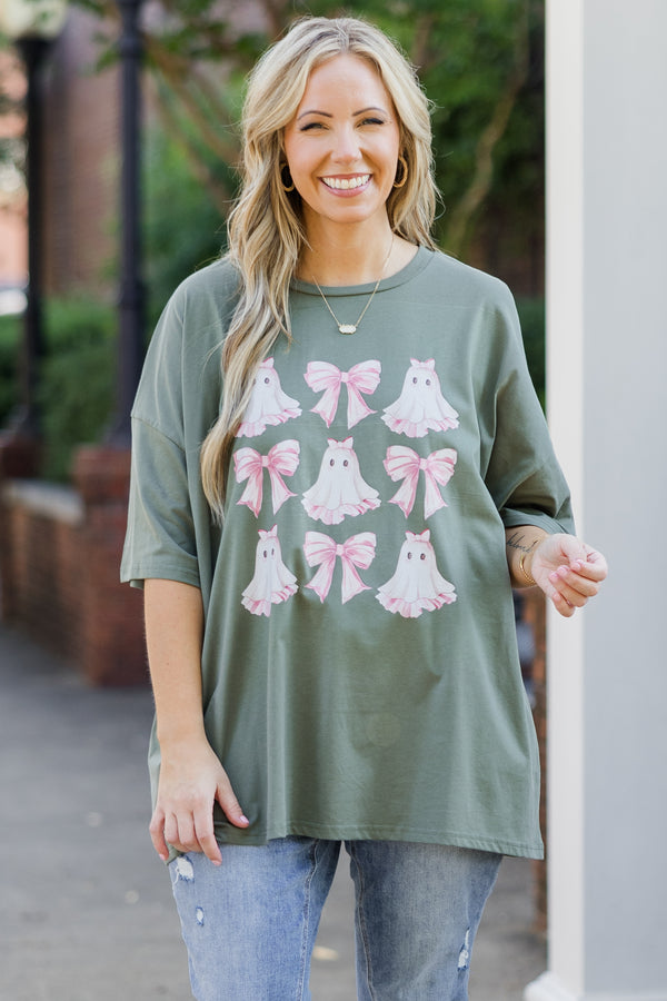 Chic Soul plus size clothing, short-sleeve moss green boyfriend tee with graphic art of pink bows and pink ghosts 