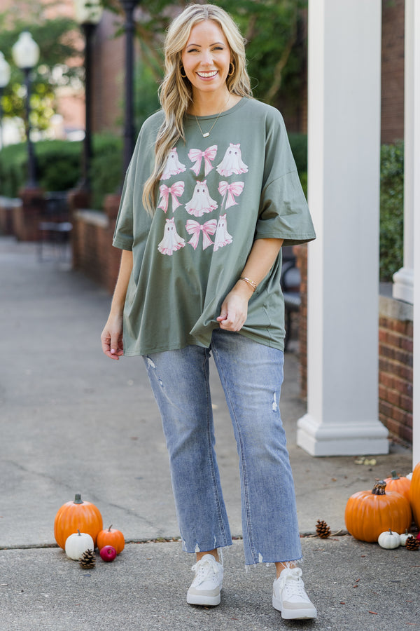 Chic Soul plus size clothing, short-sleeve moss green boyfriend tee with graphic art of pink bows and pink ghosts 