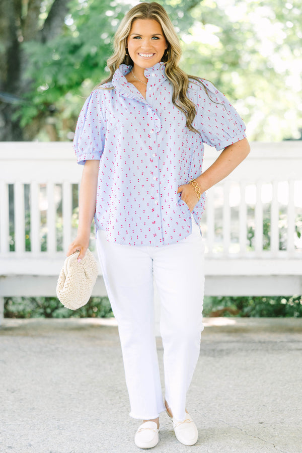 Plus Size blue gingham button-down top with red embroidery, ruffled collar, and puff sleeves.