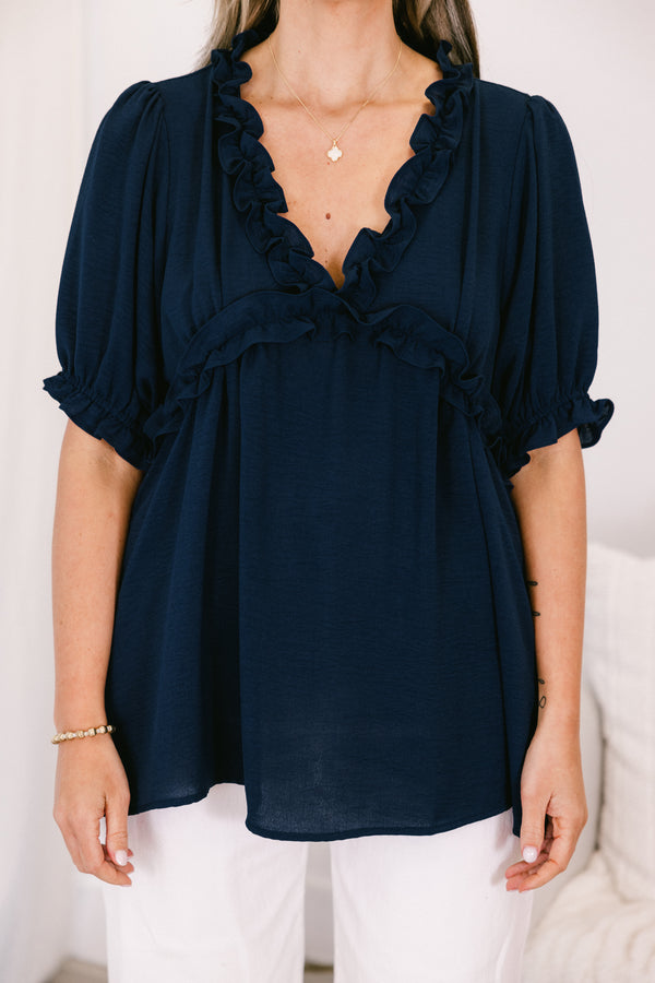 Chic soul plus size clothing, navy top with a v-neck and ruffles at the end of the sleeves and along the neckline 