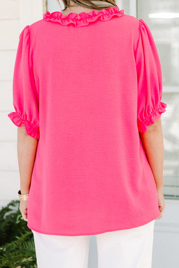 Chic soul plus size clothing, pink short sleeve top with ruffle details on the bottom of the sleeves as well as the v-neckline 
