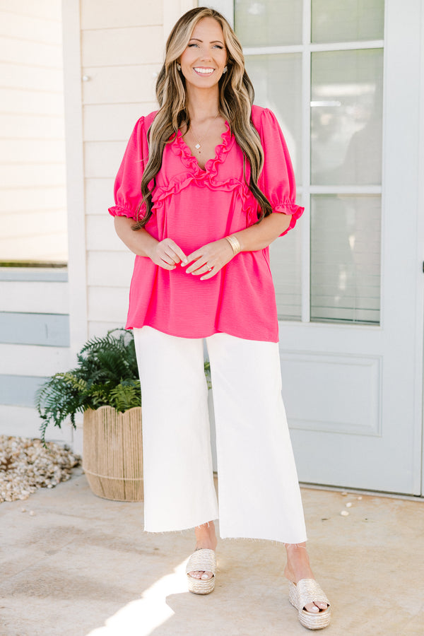 Chic soul plus size clothing, pink short sleeve top with ruffle details on the bottom of the sleeves as well as the v-neckline 
