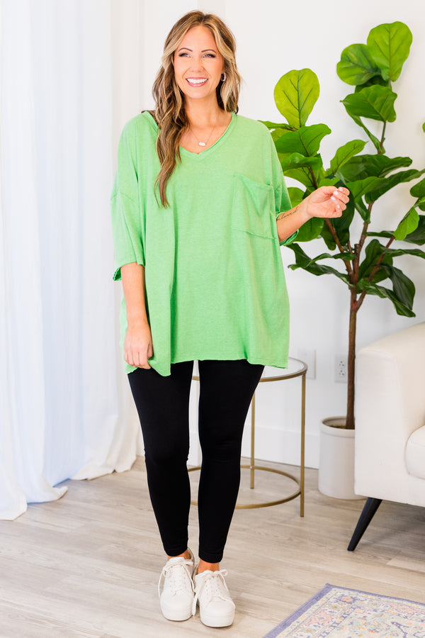 Chic Soul plus size clothing, heather green top with short sleeves, v-neckline, and left chest pocket