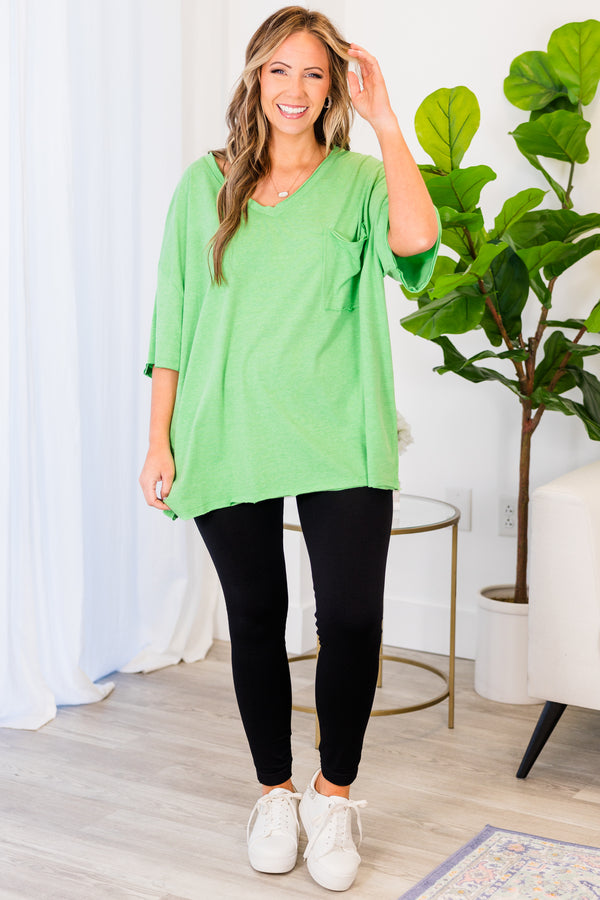 Chic Soul plus size clothing, heather green top with short sleeves, v-neckline, and left chest pocket