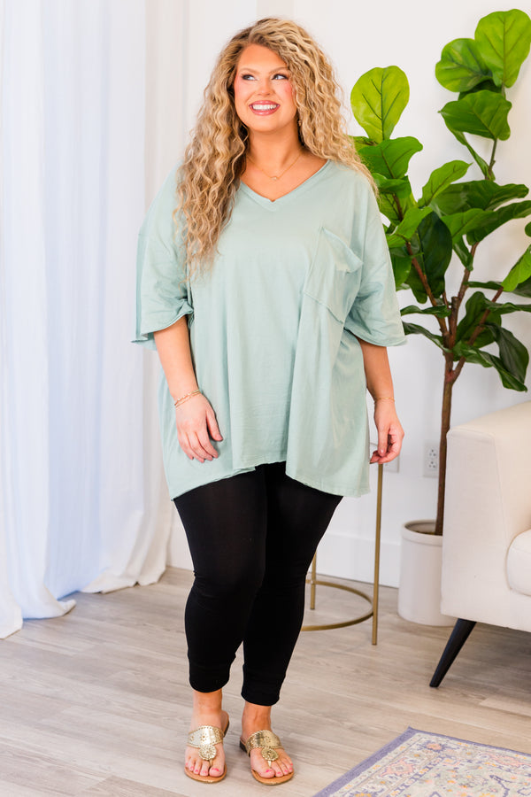 Chic Soul plus size clothing, light green top with short sleeves, v-neckline, and left chest pocket