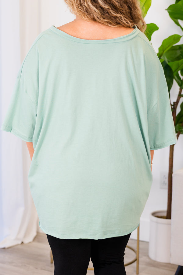 Chic Soul plus size clothing, dusty green top with short sleeves, v-neckline, and left chest pocket