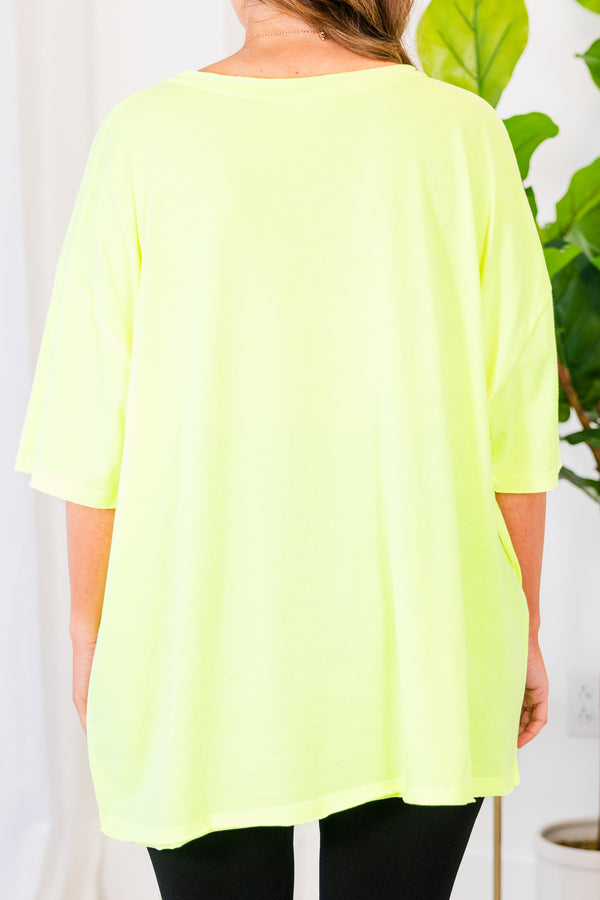 Chic Soul plus size clothing, neon lime top with short sleeves, v-neckline, and left chest pocket