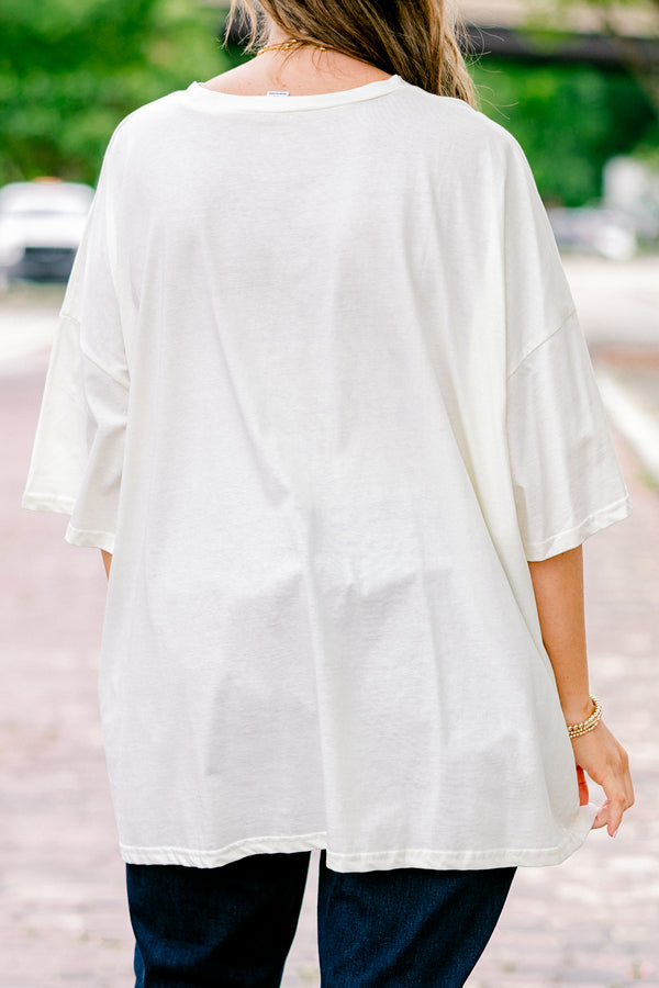 Chic Soul plus size clothing, ivory graphic tee with all post stamp graphics on the center of the shirt and a blue bow above them