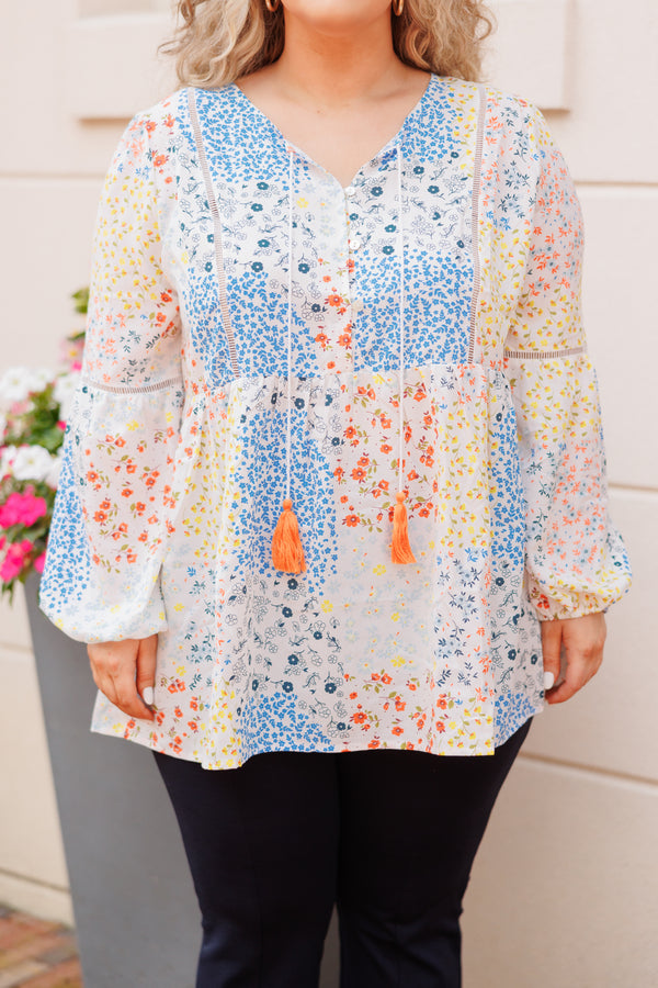Chic Soul plus size clothing, ivory babydoll top with multicolor color block floral pattern and tassel strings