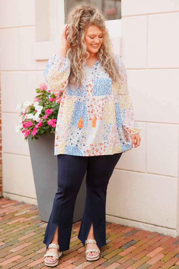 Chic Soul plus size clothing, ivory babydoll top with multicolor color block floral pattern and tassel strings