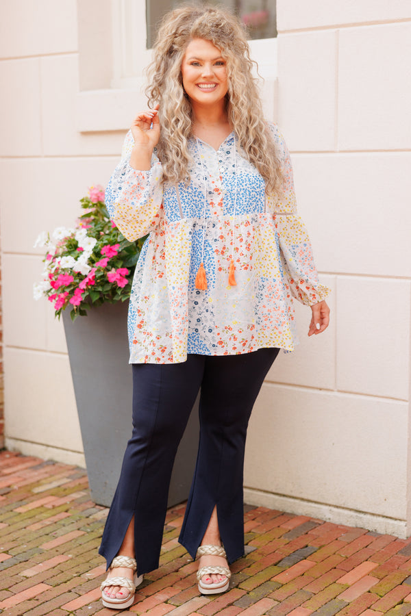 Chic Soul plus size clothing, ivory babydoll top with multicolor color block floral pattern and tassel strings