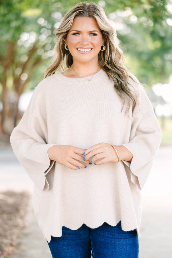 Plus Size taupe oversized knit sweater with a crew neckline, wide sleeves, and a scalloped hem.