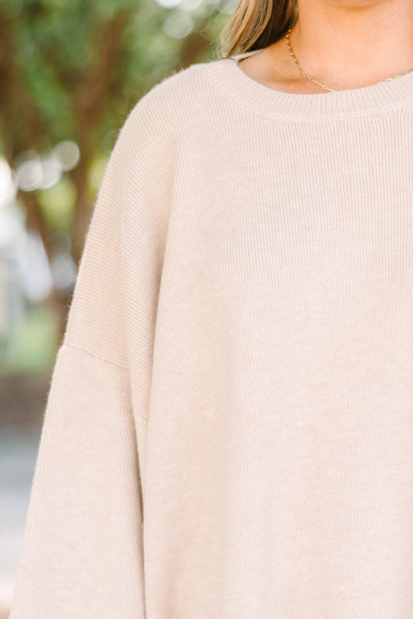 Plus Size taupe oversized knit sweater with a crew neckline, wide sleeves, and a scalloped hem.