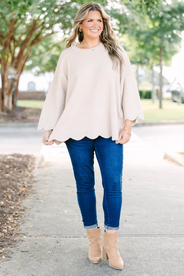 Plus Size taupe oversized knit sweater with a crew neckline, wide sleeves, and a scalloped hem.