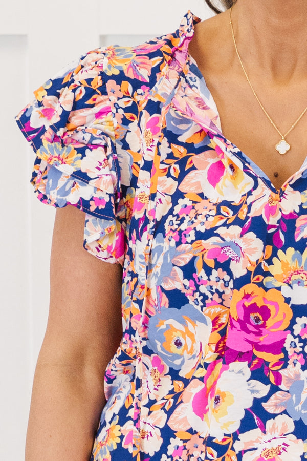 Chic Soul plus size clothing, navy-pink multi short sleeve flowy top with v cutout along neckline with ruffle detail along sleeves with large floral print