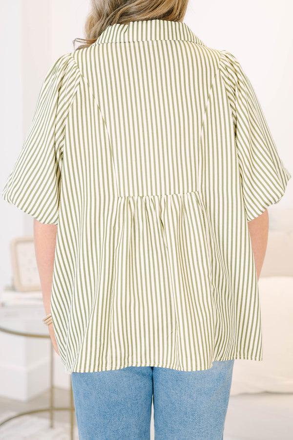 Plus Size olive and white striped top with smocked chest, v-neckline, and short flutter sleeves.