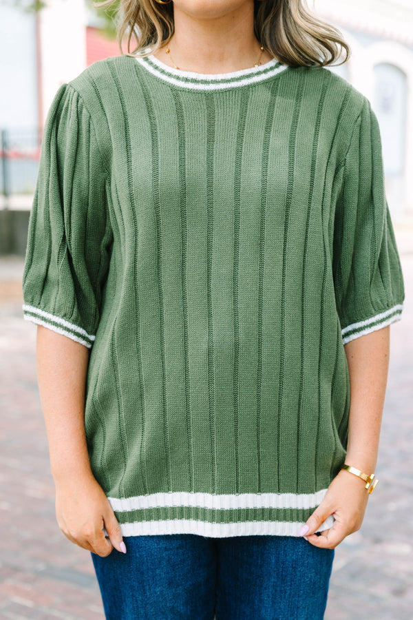 Plus Size olive green ribbed knit sweater top with white striped trim on the neck, sleeves and hem.