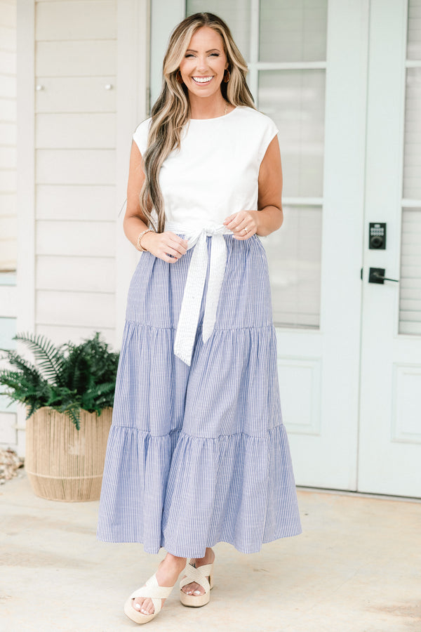 Chic Soul plus size clothing, blue short sleeve maxi dress with white short sleeve top with round neckline and tie detail on waist with three tiered printed skirt