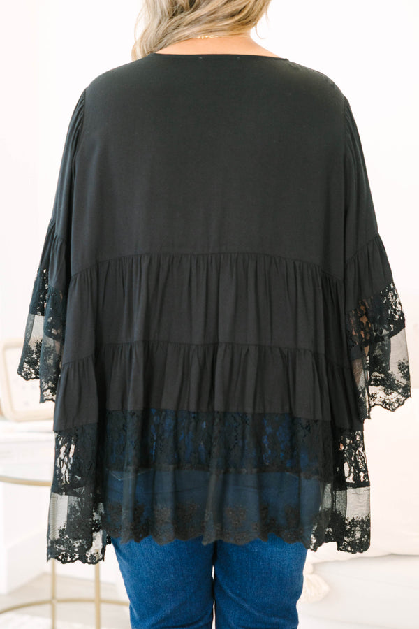 Plus Size black button-down blouse with tiered lace trim and wide lace-cuffed sleeves.