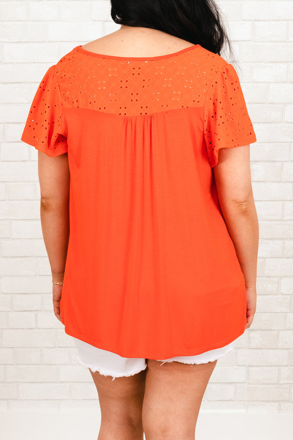 Chic Soul plus size clothing, orange flowy top with eyelet lace pattern across the top