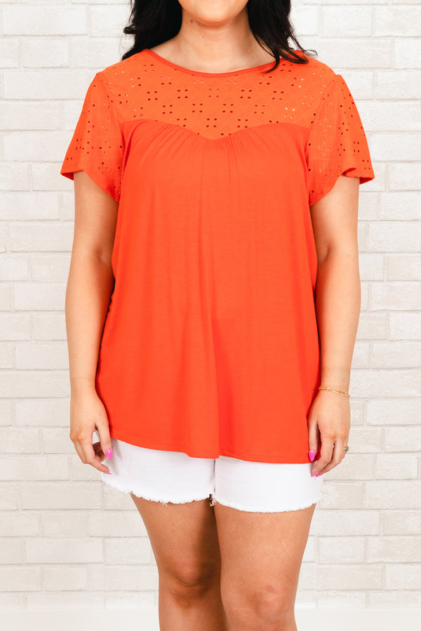 Chic Soul plus size clothing, orange flowy top with eyelet lace pattern across the top