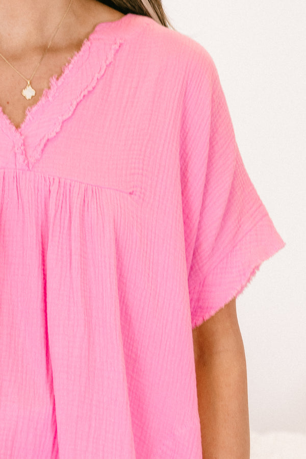 Chic Soul plus size clothing, candy pink short sleeve top with v neckline with short sleeves with pockets and raw hem detail along sleeves and bottom
