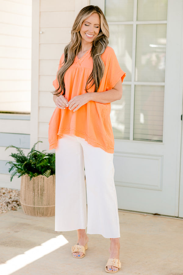 Chic Soul plus size clothing, short-sleeve distressed coral orange top with a v-neckline and a high-low distressed hemline 