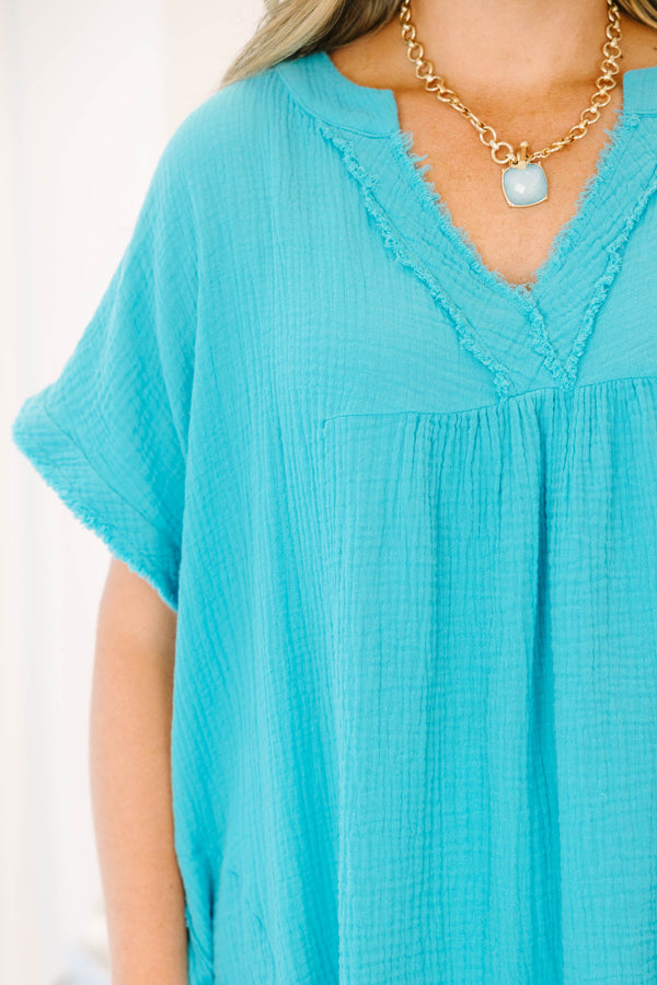 Chic Soul plus size clothing, short sleeve dusty teal gauze top with v neckline and raw cut on sleeves and bottom with light distressing