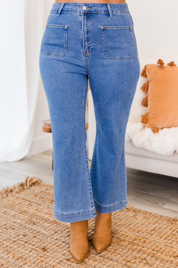 Chic Soul plus size clothing, medium wash boot cut denim jeans with two front pockets with cuffed band bottom