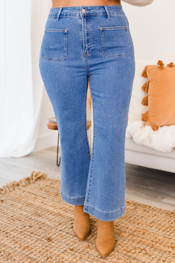 Chic Soul plus size clothing, medium wash boot cut denim jeans with two front pockets with cuffed band bottom