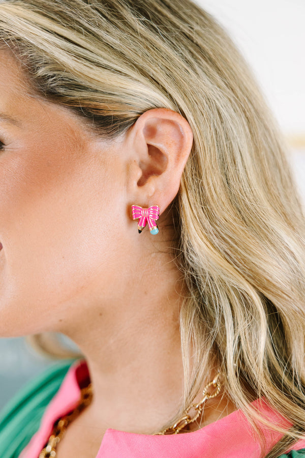 Plus Size pink pencil-shaped stud earrings with a vibrant pink bow detail and blue eraser tips.