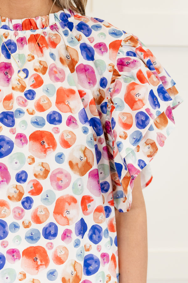 Chic Soul plus size clothing, white short sleeve top with multi dot design with flare ruffle sleeves with ruffle detail along neckline