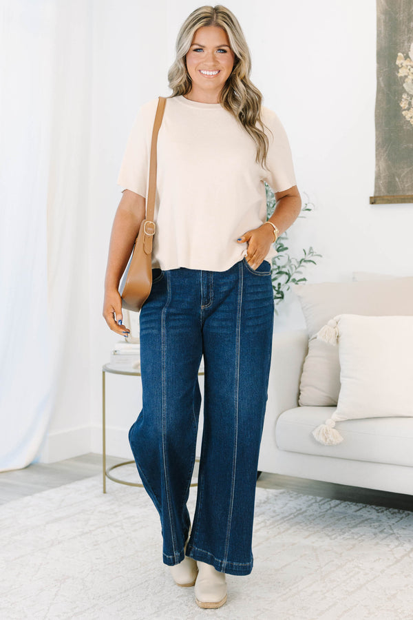 Plus size clothing, mid-rise with a cropped silhouette and front seam detail