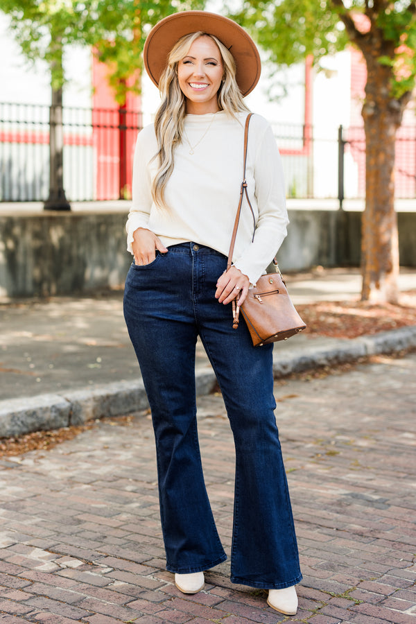 Chic Soul plus size clothing, dark wash denim jeans with flare bottom detail with stitched hem and no distressing 