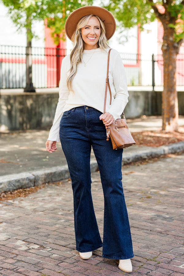 Chic Soul plus size clothing, dark wash denim jeans with flare bottom detail with stitched hem and no distressing 