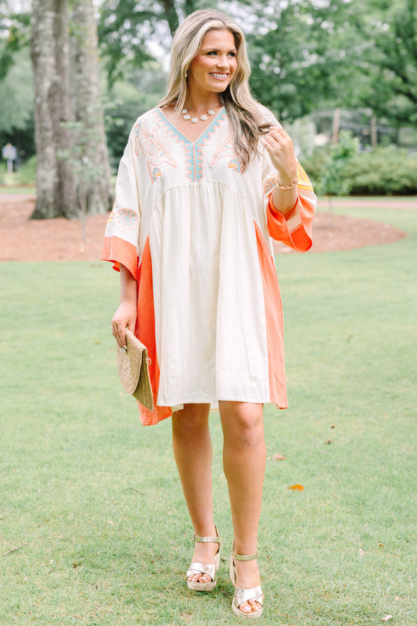 Plus Size cream and orange colorblock midi dress with embroidered V-neckline and wide sleeves.