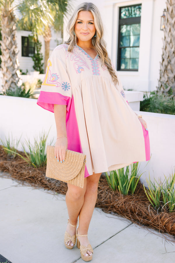 Chic Soul plus size clothing, white short sleeve mini sundress with v neckline with pink detail along bottom of sleeves with pink along the sides with yellow/blue embroidery along chest
