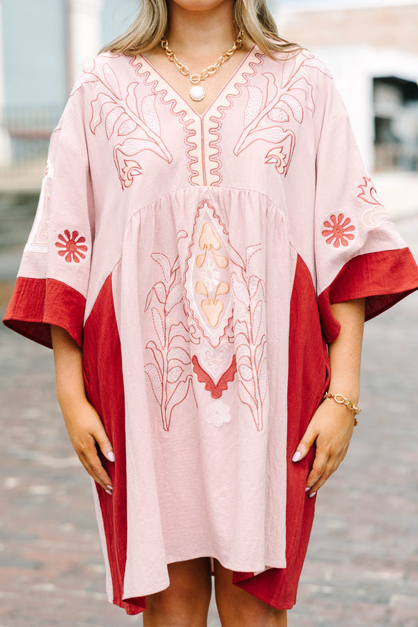 Plus Size pink blush and rust colorblock babydoll dress with intricate embroidery and wide sleeves.