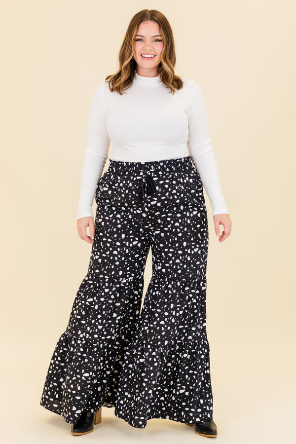 Chic Soul plus size clothing, black wide leg tiered pants with white dotted print with drawstring stretchy waist with pockets