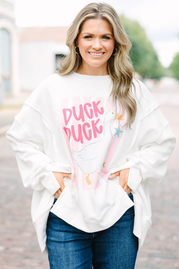 Plus Size ivory crew neck sweatshirt with a pink striped duck graphic and oversized fit.