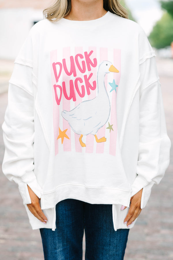 Plus Size ivory crew neck sweatshirt with a pink striped duck graphic and oversized fit.