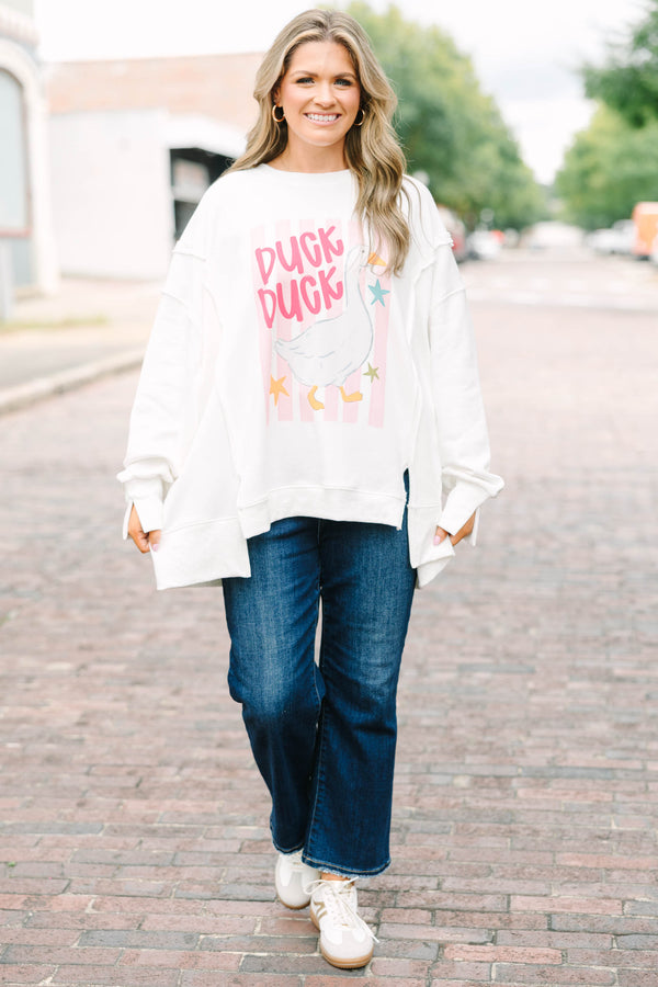 Plus Size ivory crew neck sweatshirt with a pink striped duck graphic and oversized fit.
