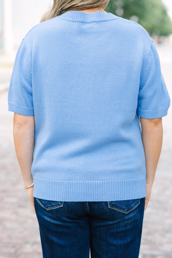 Plus Size short sleeve blue knit cardigan with functional buttons and a relaxed fit.