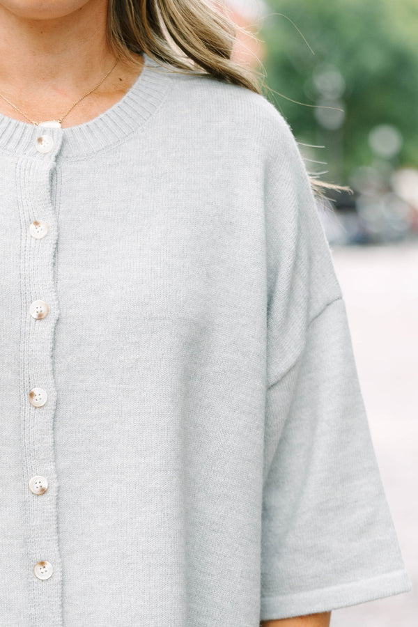 Plus Size heather gray knit cardigan with a round neckline, button-down front, and 3/4 sleeves.