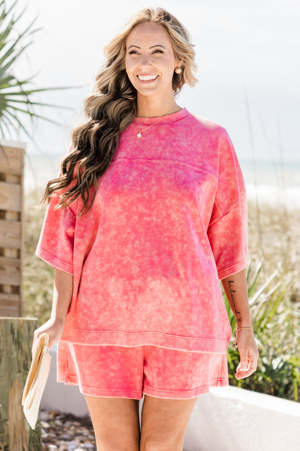 Plus Size pink acid wash short sleeve top with a crew neck and drop shoulder.