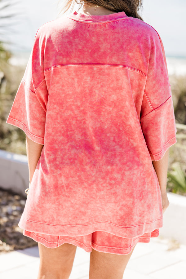 Plus Size pink acid wash short sleeve top with a crew neck and drop shoulder.