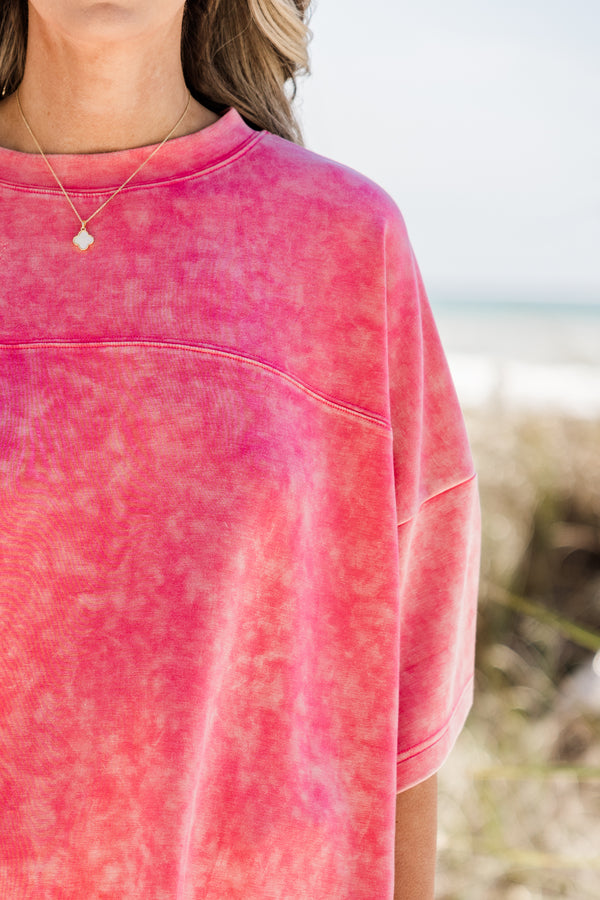 Plus Size pink acid wash short sleeve top with a crew neck and drop shoulder.