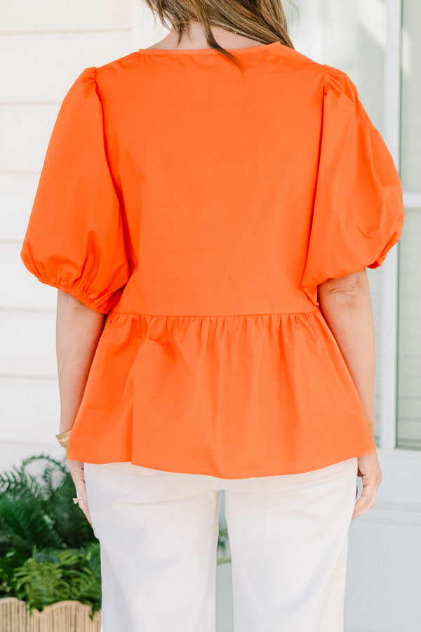 Chic Soul plus size clothing, orange short puff sleeve babydoll top with three bow ties down the front