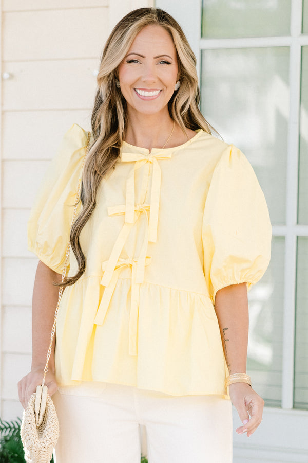 Chic Soul plus size clothing, yellow three bow tie babydoll top with puff sleeves